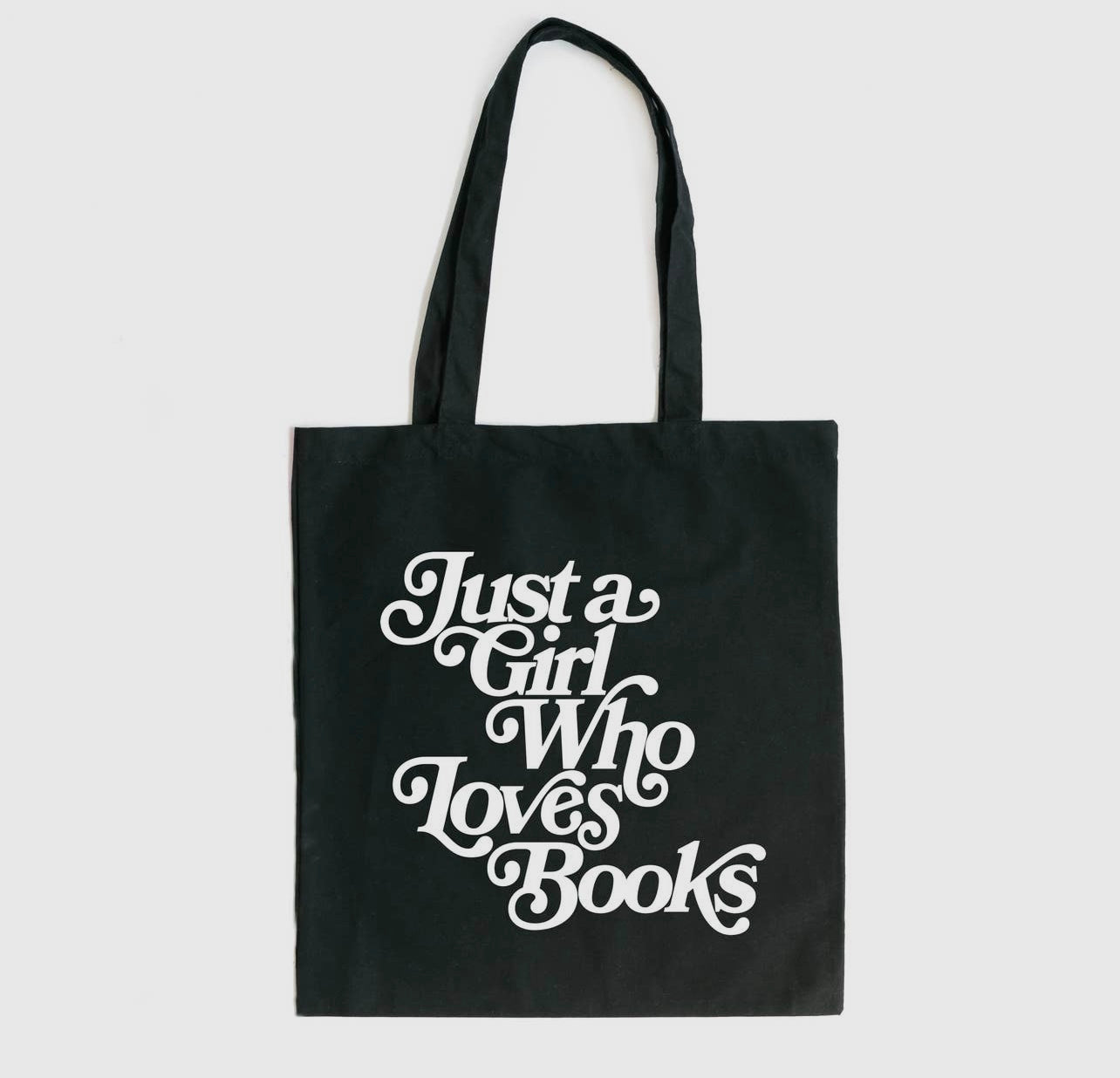 just a girl who loves books TOTE BAG